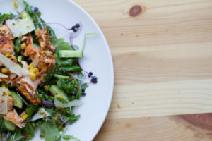 Grilled salmon asparagus salad on a bed of arugula with shaved parmesan cheese!