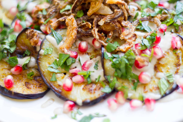 This eggplant with pomegranate tahini and crispy fried onions makes for the perfect Rosh Hashanah appetizer! 